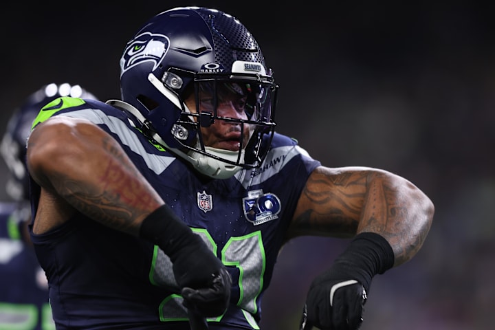 Seattle Seahawks defensive tackle Byron Murphy II (91) celebrates after a play