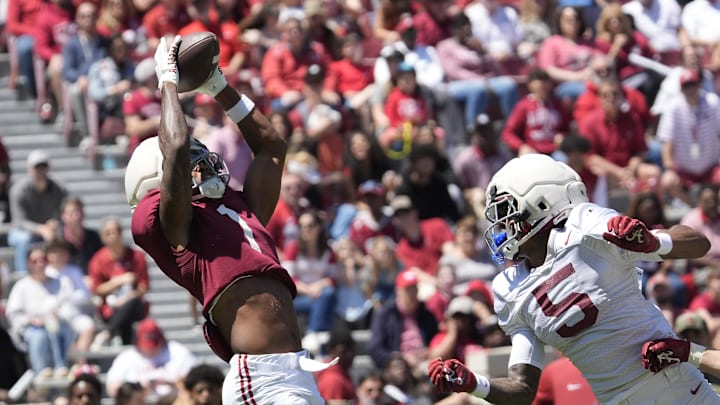 Apr 12, 2025; Tuscaloosa, AL, USA; Alabama wide receiver Isaiah Horton (1) catches a pass for a touchdown behind Alabama defensive back Dijon Lee Jr. (5) during A-Day at Bryant-Denny Stadium. Mandatory Credit: Gary Cosby/USA TODAY NETWORK via Imagn Images Apr 12, 2025; Tuscaloosa, AL, USA; Alabama wide receiver Isaiah Horton (1) catches a pass for a touchdown behind Alabama defensive back Dijon Lee Jr. (5) during A-Day at Bryant-Denny Stadium. Mandatory Credit: Gary Cosby/USA TODAY NETWORK via Imagn Images
