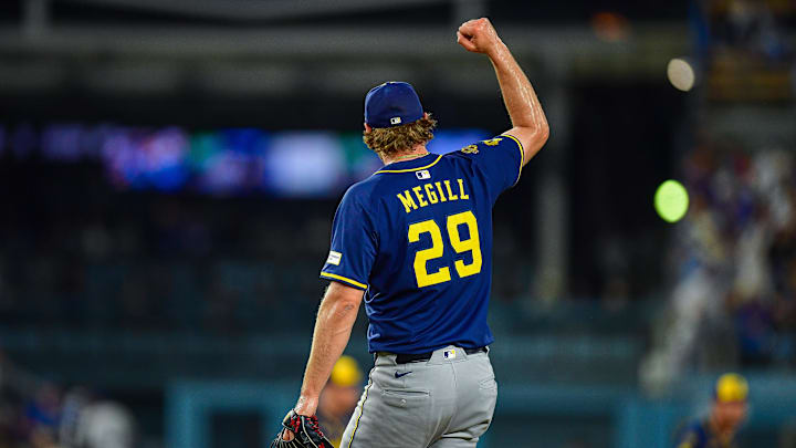 Jul 19, 2025; Los Angeles, California, USA; Milwaukee Brewers pitcher Trevor Megill (29) celebrates the victory against the Los Angeles Dodgers at Dodger Stadium. Mandatory Credit: Gary A. Vasquez-Imagn Images