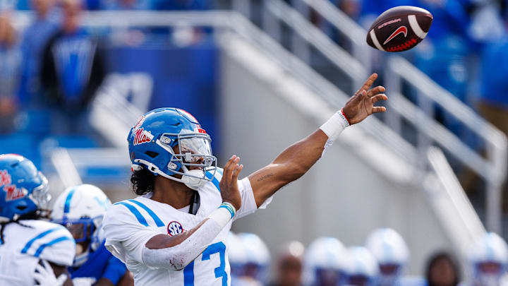 Sep 6, 2025; Lexington, Kentucky, USA; Mississippi Rebels quarterback Austin Simmons (13) throws a pass during the second quarter against the Kentucky Wildcats at Kroger Field. Mandatory Credit: Jordan Prather-Imagn Images