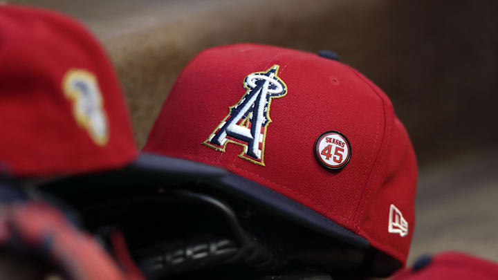 Jul 4, 2019; Arlington, TX, USA; Close up of the hats of Los Angeles Angels players during the game