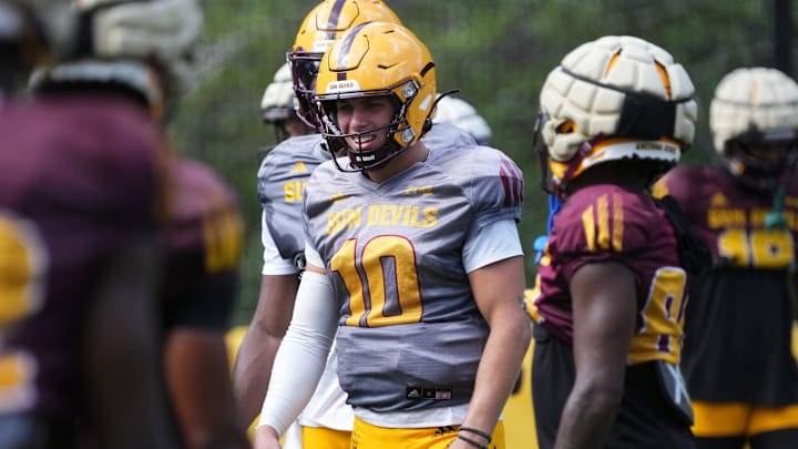 ASU quarterback Sam Leavitt (10) runs a drill as the team holds their first day of practice at Camp Tontozona on Aug. 6, 2025. ASU quarterback Sam Leavitt (10) runs a drill as the team holds their first day of practice at Camp Tontozona on Aug. 6, 2025.