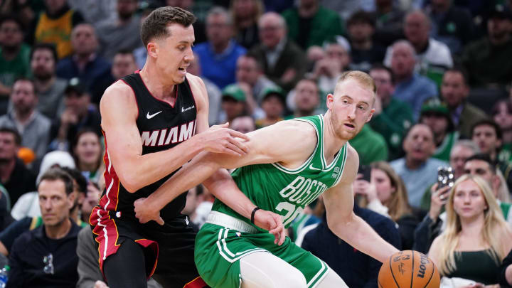 Apr 24, 2024; Boston, Massachusetts, USA; Boston Celtics forward Sam Hauser (30) works the ball against Duncan Robinson - David Butler II/USA TODAY Sports