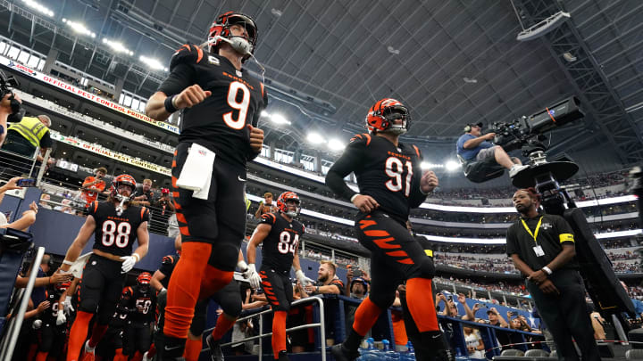 Cincinnati Bengals quarterback Joe Burrow (9) and Cincinnati Bengals defensive end Trey Hendrickson Cincinnati Bengals quarterback Joe Burrow (9) and Cincinnati Bengals defensive end Trey Hendrickson