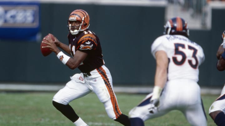 Oct 22, 2000; Cincinnati, OH, USA; Cincinnati Bengals quarterback Akili Smith (11) scrambles with the ball during the game against Denver Broncos linebacker Bill Romanowski (53) at Paul Brown Stadium. The Bengals beat the Broncos 31-21. Mandatory Credit: Matthew Emmons-Imagn Images Oct 22, 2000; Cincinnati, OH, USA; Cincinnati Bengals quarterback Akili Smith (11) scrambles with the ball during the game against Denver Broncos linebacker Bill Romanowski (53) at Paul Brown Stadium. The Bengals beat the Broncos 31-21. Mandatory Credit: Matthew Emmons-Imagn Images