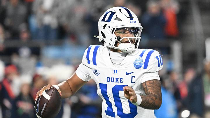Dec 6, 2025; Charlotte, NC; Duke quarterback Darian Mensah (10) looks to throw in the second quarter against Virginia. Dec 6, 2025; Charlotte, NC; Duke quarterback Darian Mensah (10) looks to throw in the second quarter against Virginia.