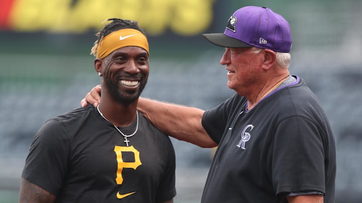 Pittsburgh Pirates designated hitter Andrew McCutchen (left) talks with Colorado Rockies interim bench coach Clint Hurdle (right) before the game at PNC Park. 