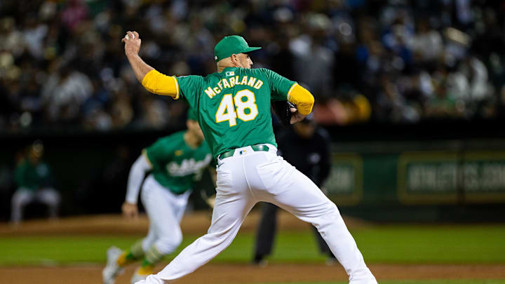 Sep 20, 2024; Oakland, California, USA; Oakland Athletics pitcher T.J. McFarland (48) throws a pitch during the tenth inning against the New York Yankees at Oakland-Alameda County Coliseum. Mandatory Credit: Bob Kupbens-Imagn Images