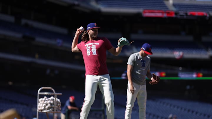 Philadelphia Phillies third baseman Alec Bohm (28) warms up before playing against the New York Mets in game one of the NLDS for the 2024 MLB Playoffs at Citizens Bank Park.