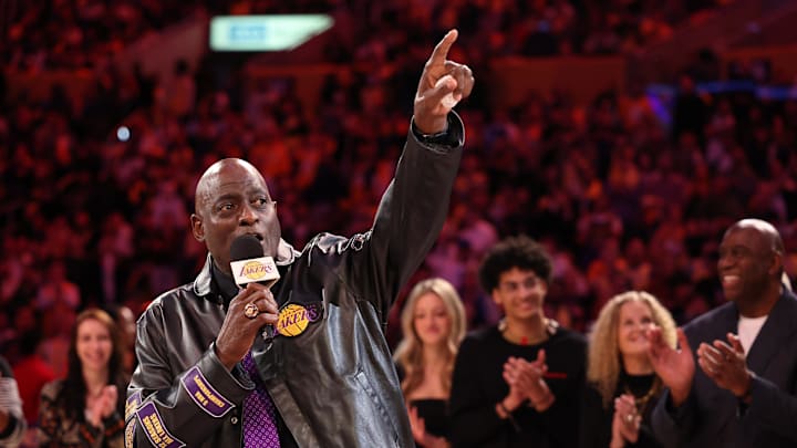 Jan 13, 2025; Los Angeles, California, USA; Former Los Angeles Laker Michael Cooper speaks during his jersey retirement at halftime between the Lakers and the San Antonio Spurs at Crypto.com Arena. Mandatory Credit: Kiyoshi Mio-Imagn Images Jan 13, 2025; Los Angeles, California, USA; Former Los Angeles Laker Michael Cooper speaks during his jersey retirement at halftime between the Lakers and the San Antonio Spurs at Crypto.com Arena. Mandatory Credit: Kiyoshi Mio-Imagn Images