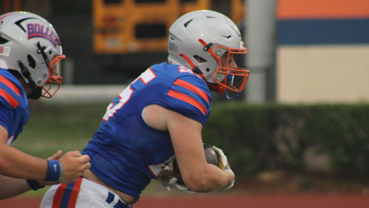 Bolles running back Xander Edwards (25) rushes for yardage against Mandarin during a high school spring football game on May 22, 2025. [Clayton Freeman/Florida Times-Union]
