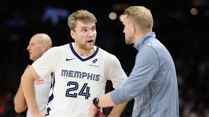 Oct 29, 2025; Phoenix, Arizona, USA; Grizzlies' guard Cam Spencer (24) receiving instructions from head coach Tuomas Iisalo during the Grizzlies' victory against the Phoenix Suns. Oct 29, 2025; Phoenix, Arizona, USA; Grizzlies' guard Cam Spencer (24) receiving instructions from head coach Tuomas Iisalo during the Grizzlies' victory against the Phoenix Suns.