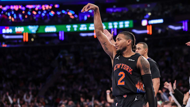 Nov 28, 2025; New York, New York, USA; New York Knicks guard Miles McBride (2) reacts after making a three point basket during the second half against the Milwaukee Bucks at Madison Square Garden. Mandatory Credit: Vincent Carchietta-Imagn Images