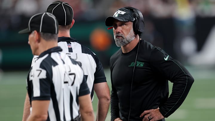 Oct 31, 2024; East Rutherford, New Jersey, USA; New York Jets interim head coach Jeff Ulbrich talks to the officials during the second quarter against the Houston Texans at MetLife Stadium. 