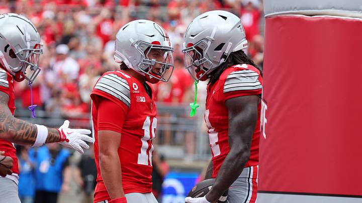Sep 5, 2026; Columbus, Ohio, USA; Ohio State Buckeyes quarterback Julian Sayin (10) celebrates the touchdown throw to wide receiver Jeremiah Smith (4) during the second quarter against the Ball State Cardinals at Ohio Stadium. Mandatory Credit: Joseph Maiorana-Imagn Images Sep 5, 2026; Columbus, Ohio, USA; Ohio State Buckeyes quarterback Julian Sayin (10) celebrates the touchdown throw to wide receiver Jeremiah Smith (4) during the second quarter against the Ball State Cardinals at Ohio Stadium. Mandatory Credit: Joseph Maiorana-Imagn Images
