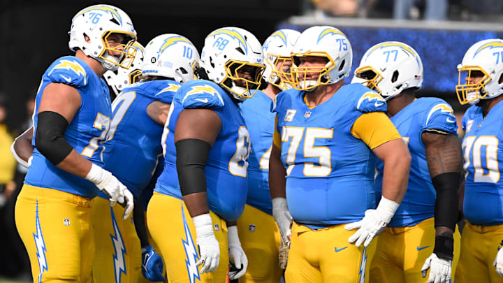 Los Angeles Chargers offensive tackle Joe Alt, quarterback Justin Herbert, guard Jamaree Salyer, fullback Scott Matlock, center Bradley Bozeman, guard Zion Johnson, and offensive tackle Rashawn Slater during and NFL game against the Tennessee Titans at SoFi Stadium. 