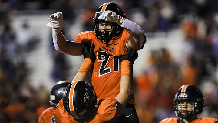 Ryle's Jacob Savage (21) celebrates after scoring a touchdown against Campbell County in the first half at Ryle High School Oct. 11, 2024.