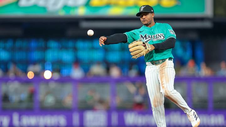 Miami Marlins second baseman Xavier Edwards throws to first base Miami Marlins second baseman Xavier Edwards throws to first base