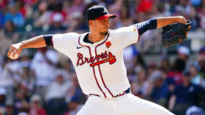 May 27, 2024; Cumberland, Georgia, USA; Atlanta Braves pitcher Charlie Morton (50) pitching against the Washington Nationals during the third inning at Truist Park. Mandatory Credit: John David Mercer-USA TODAY Sports