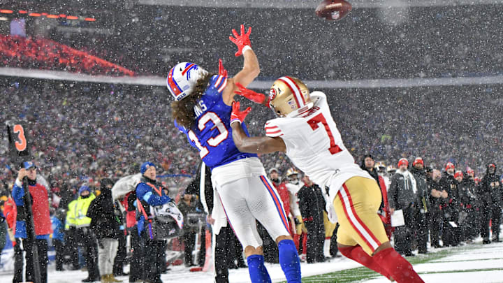 Dec 1, 2024; Orchard Park, New York, USA; Buffalo Bills wide receiver Mack Hollins (13) catches a touchdown over San Francisco 49ers cornerback Charvarius Ward (7)