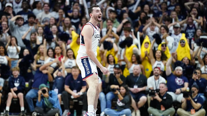 Nov 6, 2024; Storrs, Connecticut, USA; Connecticut Huskies forward Alex Karaban (11) reacts after a play against the Sacred Heart Pioneers in the second half at Harry A. Gampel Pavilion. Mandatory Credit: David Butler II-Imagn Images