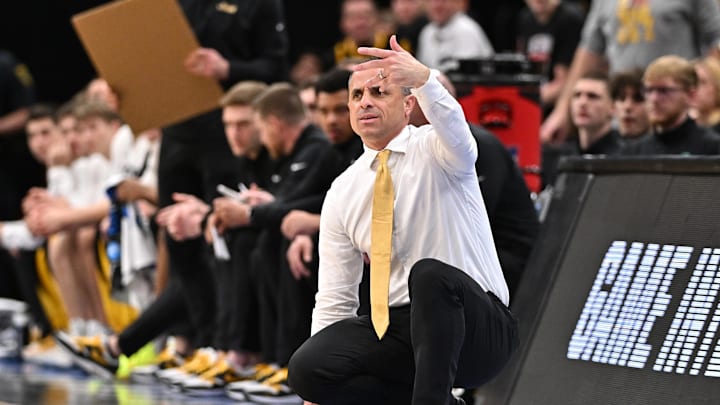 Mar 28, 2026; Houston, TX, USA; Iowa Hawkeyes head coach Ben McCollum looks on in the first half against the Illinois Fighting Illini during an Elite Eight game of the South Regional of the men's 2026 NCAA Tournament at Toyota Center. Mandatory Credit: Maria Lysaker-Imagn Images Mar 28, 2026; Houston, TX, USA; Iowa Hawkeyes head coach Ben McCollum looks on in the first half against the Illinois Fighting Illini during an Elite Eight game of the South Regional of the men's 2026 NCAA Tournament at Toyota Center. Mandatory Credit: Maria Lysaker-Imagn Images
