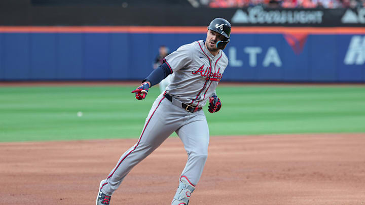 Jul 26, 2024; New York City, New York, USA; Atlanta Braves right fielder Adam Duvall (14) rounds third base after hitting a two run home run during the second inning against the New York Mets at Citi Field. Mandatory Credit: Vincent Carchietta-Imagn Images Jul 26, 2024; New York City, New York, USA; Atlanta Braves right fielder Adam Duvall (14) rounds third base after hitting a two run home run during the second inning against the New York Mets at Citi Field. Mandatory Credit: Vincent Carchietta-Imagn Images