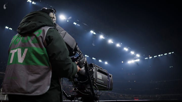 A cameraman works with a TV camera during the Serie A