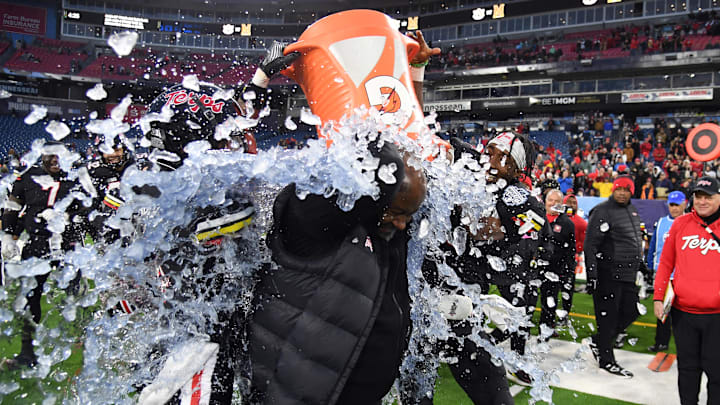 Big Ten head football coach drenched with Gatorade after a win against the Auburn Tigers Big Ten head football coach drenched with Gatorade after a win against the Auburn Tigers