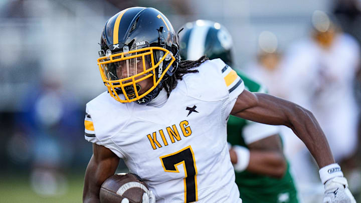 Detroit King wide receiver Damon Stennis (7) makes a catch against Cass Tech during the first half at Cass Tech High School in Detroit on Friday, Sept. 20, 2024.