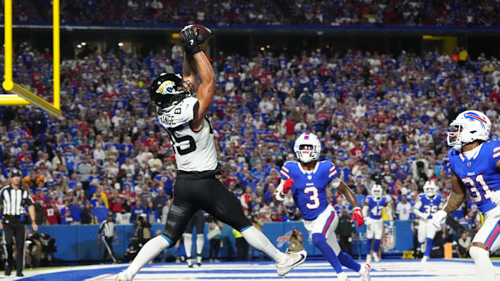 Sep 23, 2024; Orchard Park, New York, USA; Jacksonville Jaguars tight end Brenton Strange (85) makes a catch for a touchdown against Buffalo Bills safety Damar Hamlin (3) during the second half at Highmark Stadium. Mandatory Credit: Gregory Fisher-Imagn Images