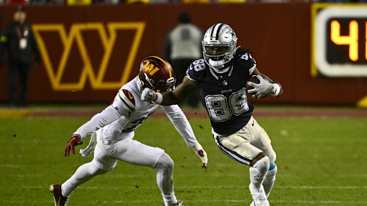 Jan 7, 2024; Landover, Maryland, USA; Dallas Cowboys wide receiver CeeDee Lamb (88) runs past Washington Commanders cornerback Tariq Castro-Fields (26) . Jan 7, 2024; Landover, Maryland, USA; Dallas Cowboys wide receiver CeeDee Lamb (88) runs past Washington Commanders cornerback Tariq Castro-Fields (26) .