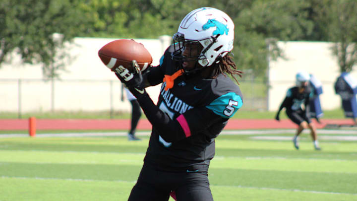 Providence wide receiver Noah Johnson (5) catches a pass in warm-ups before a high school football game against Christ's Church on October 12, 2024. Florida high school football teams now have an extra week to complete their regular season schedules thanks to a ruling on Monday by the FHSAA.