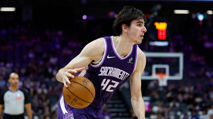 Mar 19, 2026; Sacramento, California, USA; Sacramento Kings center Maxime Raynaud (42) dribbles the ball during the fourth quarter against the Philadelphia 76ers at Golden 1 Center.