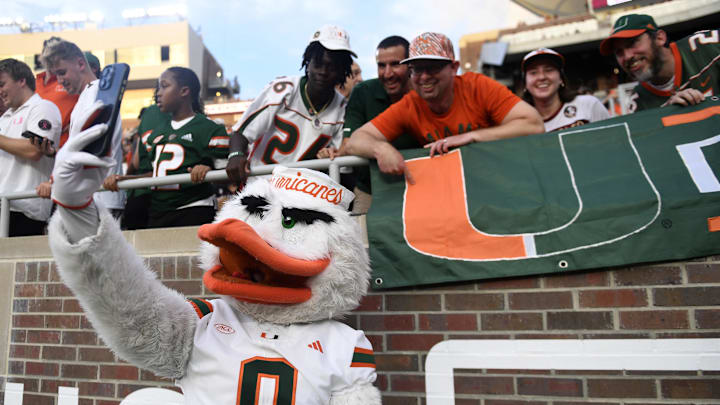 Oct 4, 2025; Tallahassee, Florida, USA; Miami Hurricanes mascot takes selfies with fans before a game against the Florida State Seminoles at Doak S. Campbell Stadium. Mandatory Credit: Melina Myers-Imagn Images