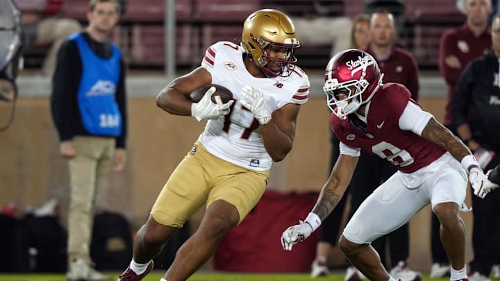 Sep 13, 2025; Stanford, California, USA; Boston College Eagles tight end Jeremiah Franklin (17) runs after a catch against Stanford Cardinal cornerback Cam Richardson (8) during the first quarter at Stanford Stadium. Mandatory Credit: Darren Yamashita-Imagn Images Sep 13, 2025; Stanford, California, USA; Boston College Eagles tight end Jeremiah Franklin (17) runs after a catch against Stanford Cardinal cornerback Cam Richardson (8) during the first quarter at Stanford Stadium. Mandatory Credit: Darren Yamashita-Imagn Images