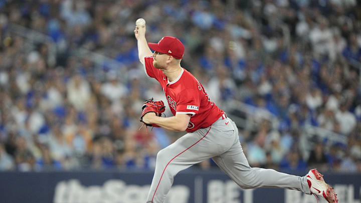 Jul 5, 2025; Toronto, Ontario, CAN; Los Angeles Angels pitcher Ryan Zeferjahn (56) pitches to the Toronto Blue Jays during the tenth inning at Rogers Centre. Mandatory Credit: John E. Sokolowski-Imagn Images