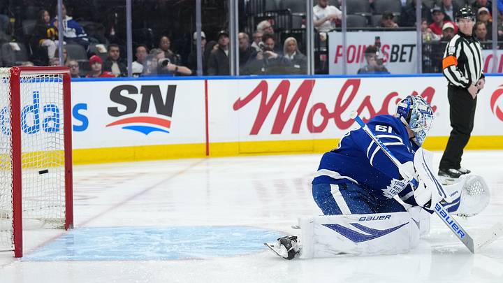 Apr 8, 2026; Toronto, Ontario, CAN; The puck goes past Toronto Maple Leafs goaltender Joseph Woll (60) for a goal against the Washington Capitals during the second period at Scotiabank Arena. Mandatory Credit: Nick Turchiaro-Imagn Images