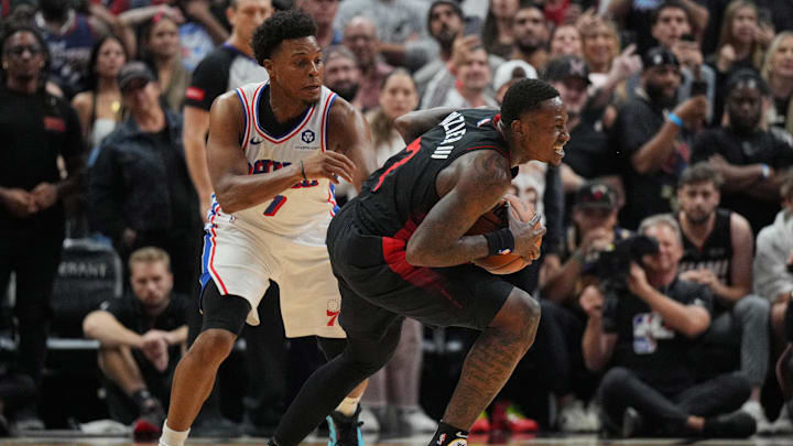 Apr 4, 2024; Miami, Florida, USA;  Miami Heat guard Terry Rozier (2) steals the ball from Philadelphia 76ers guard Kyle Lowry (7) during the second half at Kaseya Center. Mandatory Credit: Jim Rassol-Imagn Images