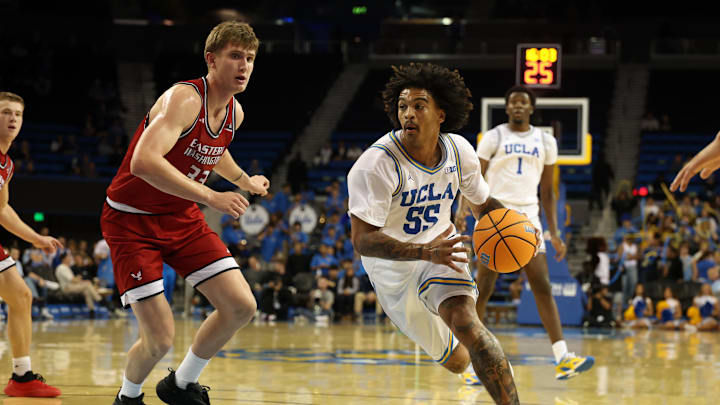 Nov 3, 2025; Los Angeles, California, USA;  UCLA Bruins guard Skyy Clark (55) drives to the basket against Eastern Washington Eagles forward Emmett Marquardt (33) during the second half at Pauley Pavilion presented by Wescom Financial. Mandatory Credit: Kiyoshi Mio-Imagn Images