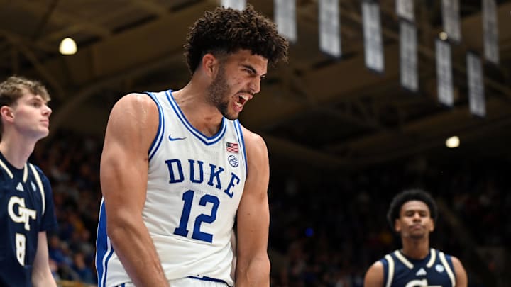 Dec 31, 2025; Durham, North Carolina, USA; Duke Blue Devils forward Cameron Boozer (12) reacts after scoring during the second half against the Georgia Tech Yellow Jackets at Cameron Indoor Stadium.   The Blue Devils won 85-79.  Mandatory Credit: Rob Kinnan-Imagn Images