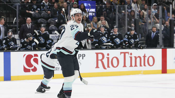 Dec 12, 2025; Salt Lake City, Utah, USA; Seattle Kraken left wing Mason Marchment (27) celebrates scoring a goal against the Utah Mammoth during the third period at Delta Center. Mandatory Credit: Rob Gray-Imagn Images