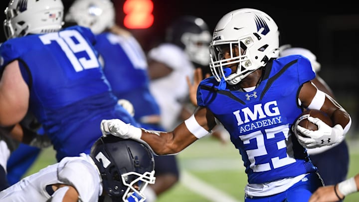 IMG Academy Blue running back Kai Theeke (23.)