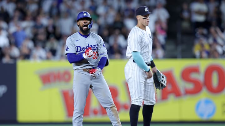 Jun 7, 2024; Bronx, New York, USA; Los Angeles Dodgers left fielder Teoscar Hernandez (37) reacts after his two run double against the New York Yankees during the eleventh inning at Yankee Stadium. Mandatory Credit: Brad Penner-USA TODAY Sports