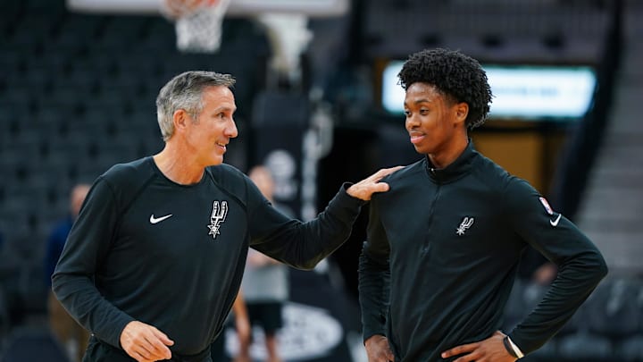 Mar 12, 2022; San Antonio, Texas, USA; San Antonio Spurs assistant coach Chip Engelland talks with guard Joshua Primo (11) before the game against the Indiana Pacers at the AT&T Center. Mandatory Credit: Daniel Dunn-Imagn Images Mar 12, 2022; San Antonio, Texas, USA; San Antonio Spurs assistant coach Chip Engelland talks with guard Joshua Primo (11) before the game against the Indiana Pacers at the AT&T Center. Mandatory Credit: Daniel Dunn-Imagn Images