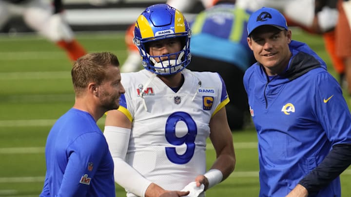 Feb 13, 2022; Inglewood, CA, USA;  Los Angeles Rams head coach Sean McVay talks with quarterback Matthew Stafford (9) before playing against the Cincinnati Bengals in Super Bowl LVI at SoFi Stadium. Mandatory Credit: Robert Hanashiro-Imagn Images