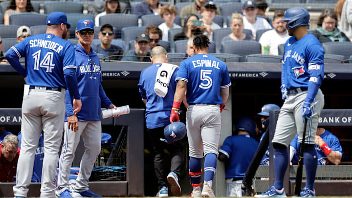 Santiago Espinal leaves the game after hit-by-pitch
