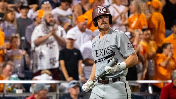 Jun 24, 2024; Omaha, NE, USA; Texas A&M Aggies designated hitter Hayden Schott (5) walks off after striking out against the Tennessee Volunteers during the ninth inning at Charles Schwab Field Omaha. Mandatory Credit: Dylan Widger-Imagn Images Jun 24, 2024; Omaha, NE, USA; Texas A&M Aggies designated hitter Hayden Schott (5) walks off after striking out against the Tennessee Volunteers during the ninth inning at Charles Schwab Field Omaha. Mandatory Credit: Dylan Widger-Imagn Images