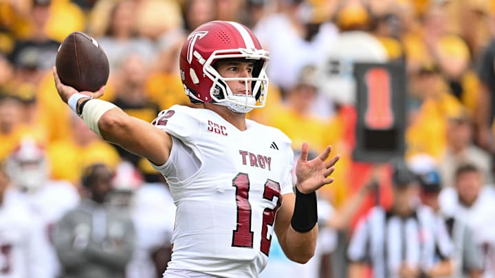 Sep 14, 2024; Iowa City, Iowa, USA; Troy Trojans quarterback Matthew Caldwell (12) throws a pass during the first quarter against the Iowa Hawkeyes at Kinnick Stadium. Mandatory Credit: Jeffrey Becker-Imagn Images Sep 14, 2024; Iowa City, Iowa, USA; Troy Trojans quarterback Matthew Caldwell (12) throws a pass during the first quarter against the Iowa Hawkeyes at Kinnick Stadium. Mandatory Credit: Jeffrey Becker-Imagn Images