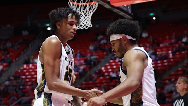 California Baptist Lancers forward Thomas Ndong (25) and guard Dominique Daniels Jr. (1) 